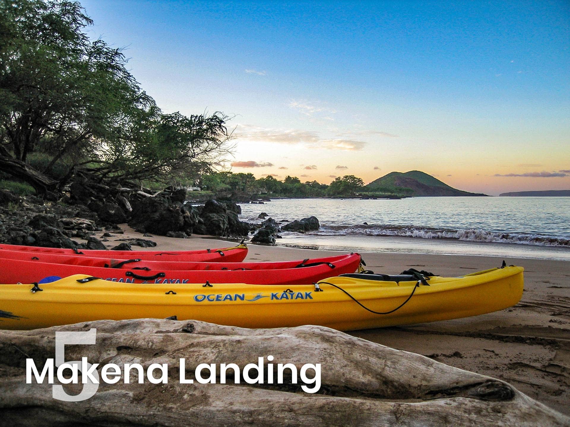 kayaks on the beach at Makena Landing at Sunrise