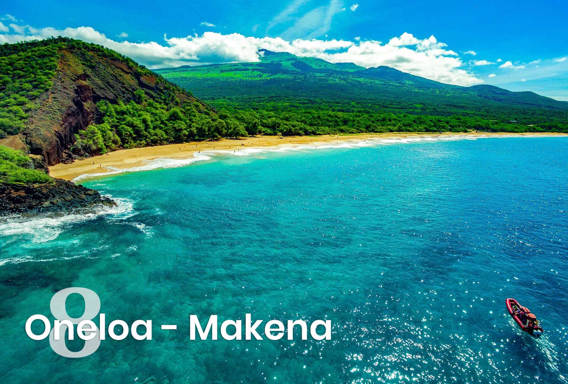 text says oneloa - Makena with a picture of the beach behind it and a redline raft in the water